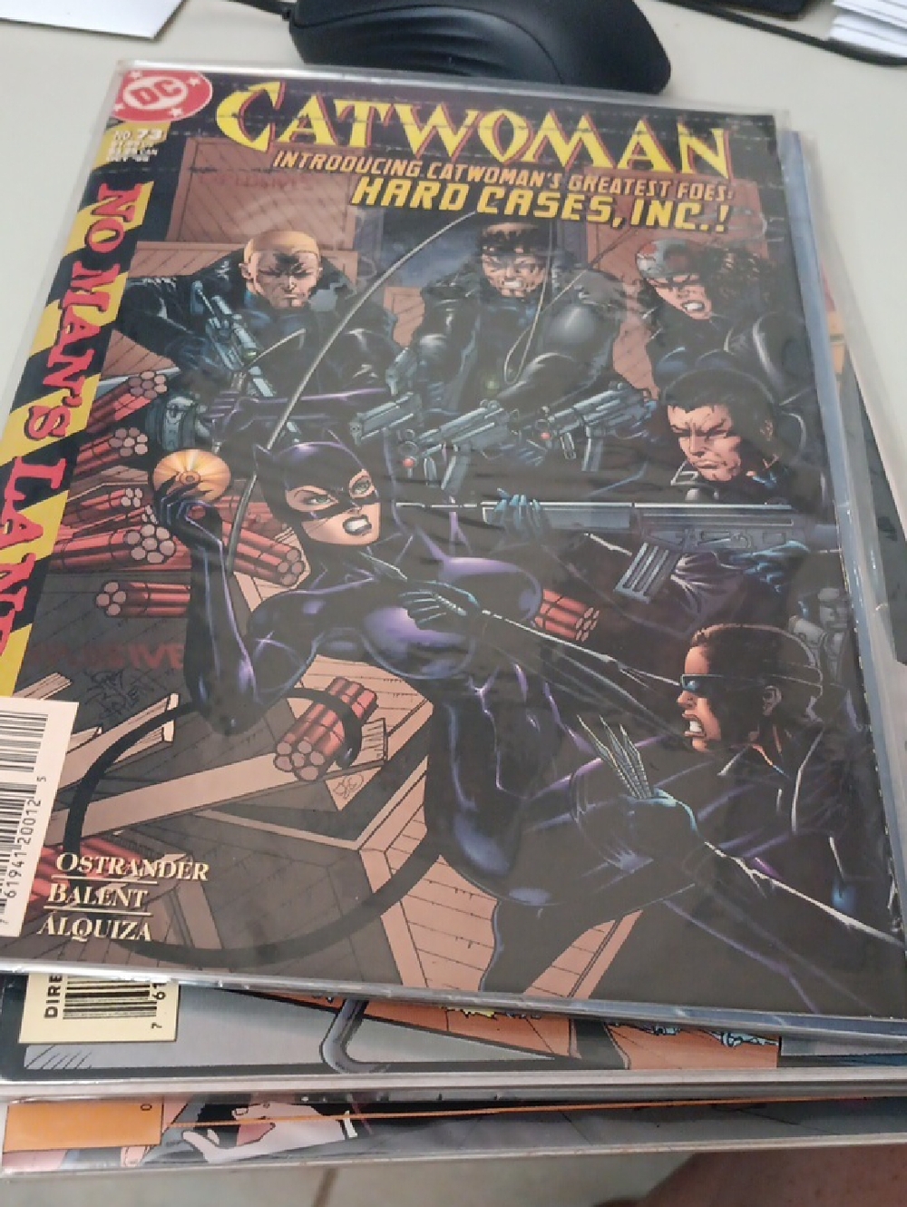 DC Catwoman Comic Cover in Black and Purple In A Sleeve